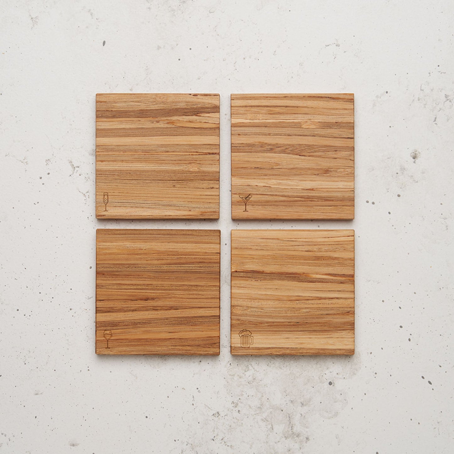 An over head view of the happy hour themed all day every day coaster set