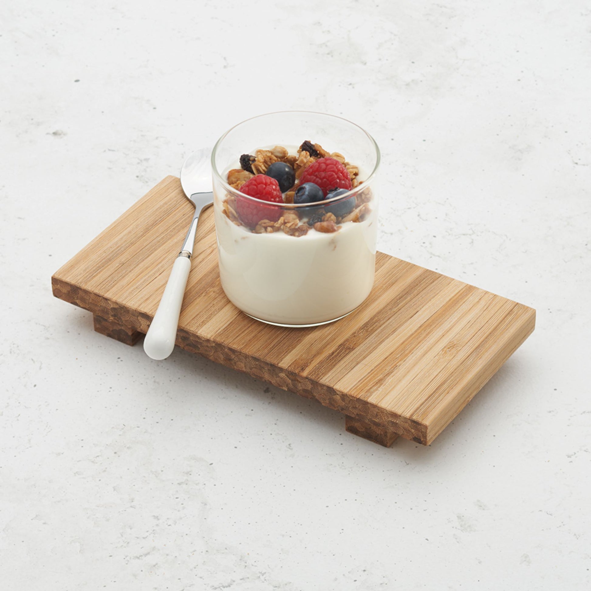 tray with cup of yogurt and berries