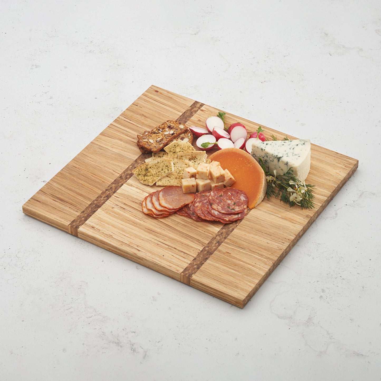 large gather and graze serving board fill with charcuterie items