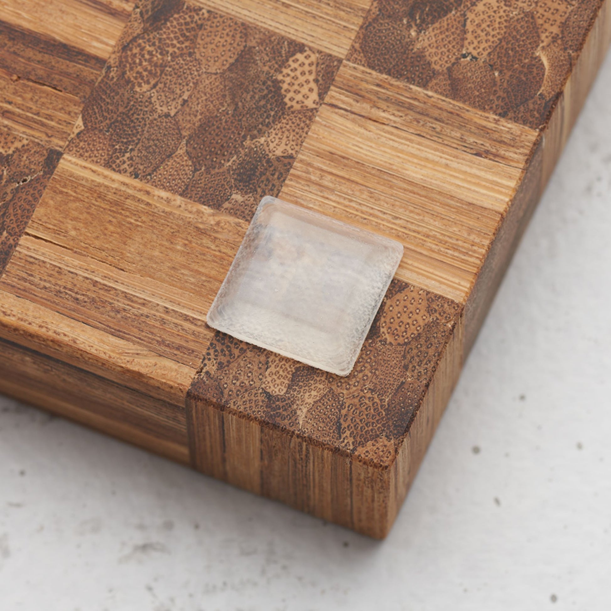 Close up view of the slide proof bumper on the back of the game night snack board