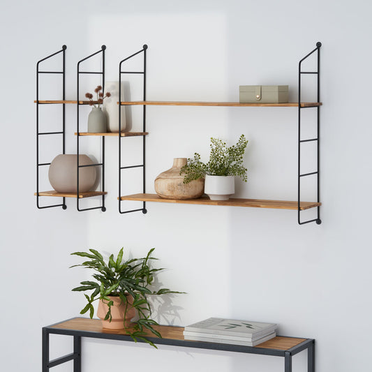 mix and match modular shelves mounted in a wall in the living room - each shelf unit features shelves made of recycled chopsticks.