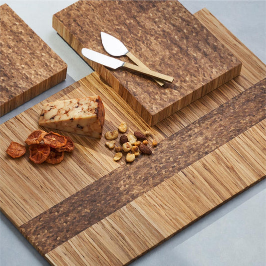 fast lane board with charceuterie items and two knives