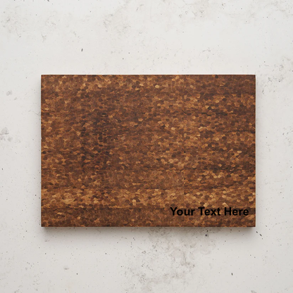 Overhead view of the medium size care to share charceuterie board. The phrase "Your Text Here" is digitally superimposed in black text over the bottom right corner of the board.