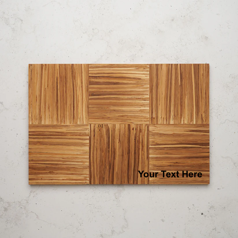 Overhead view of the alternating grain pattern in the large smorgas board. The board features a checkerboard-like pattern where rectangular sections alternate between vertical and horizontal wood grain orientation, with "Your Text Here" overlaid in the bottom right corner.