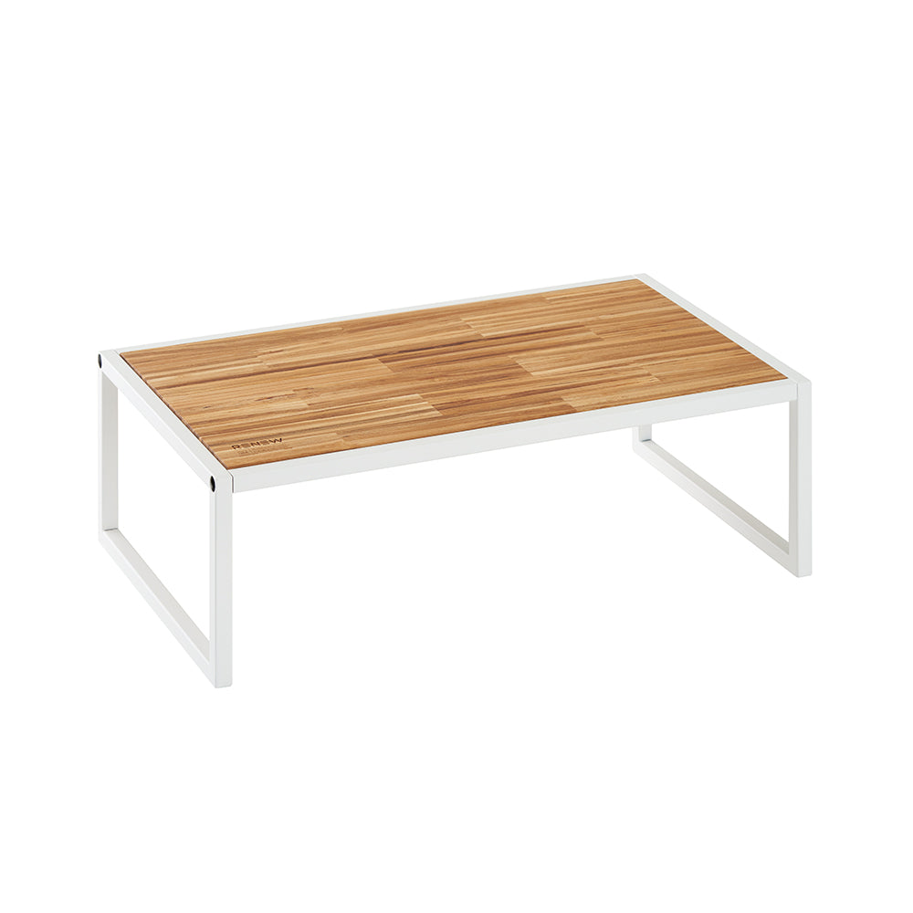 A rectangular monitor stand or small desk riser featuring a light-toned, butcher-block style wooden surface and a minimalist white metal frame. The frame has a modern, open U-shaped leg design on both sides, creating a clean and elevated look for a workspace.